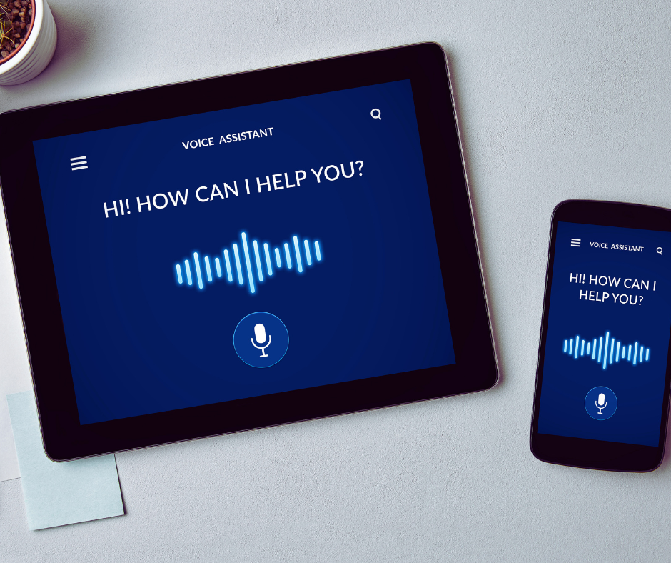Tablet and mobile phone with the text on the screen that says "voice assistant"